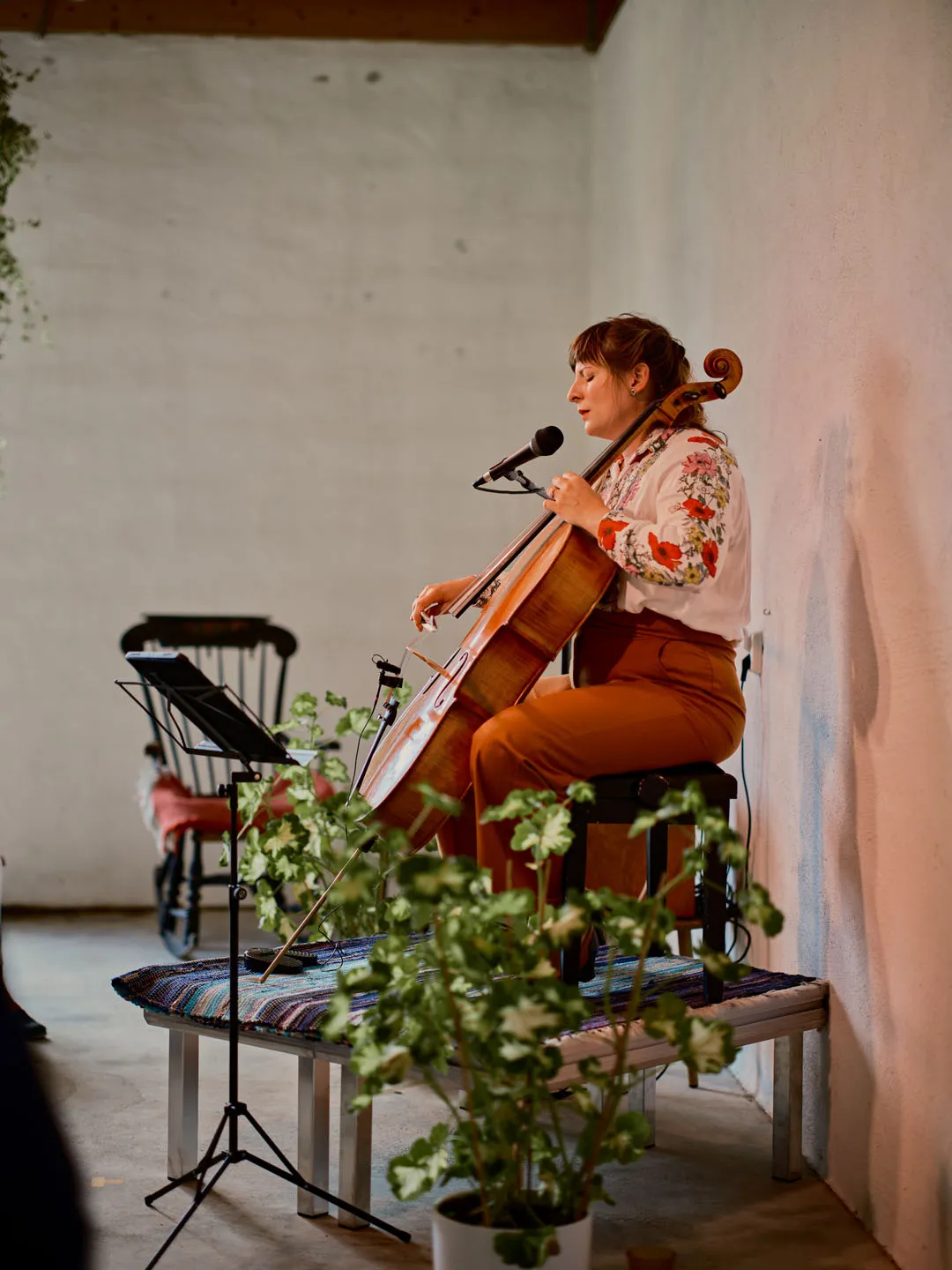a woman playing a cello